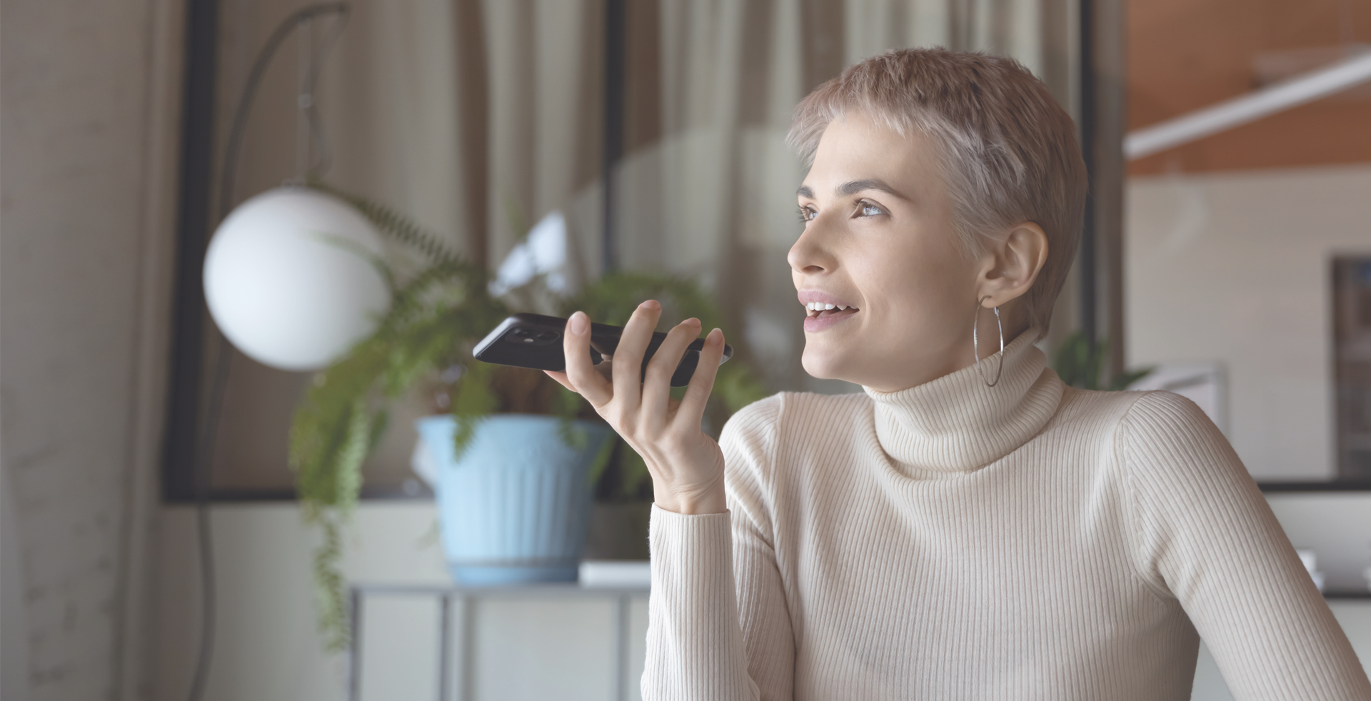 A woman speaks on a phone